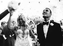 C2020-MArnold – ornate sleeveless fit-to-flare embroidered wedding gown